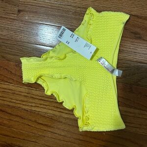 Brand new with tags urban outfitters highlighter yellow bikini bottoms size med